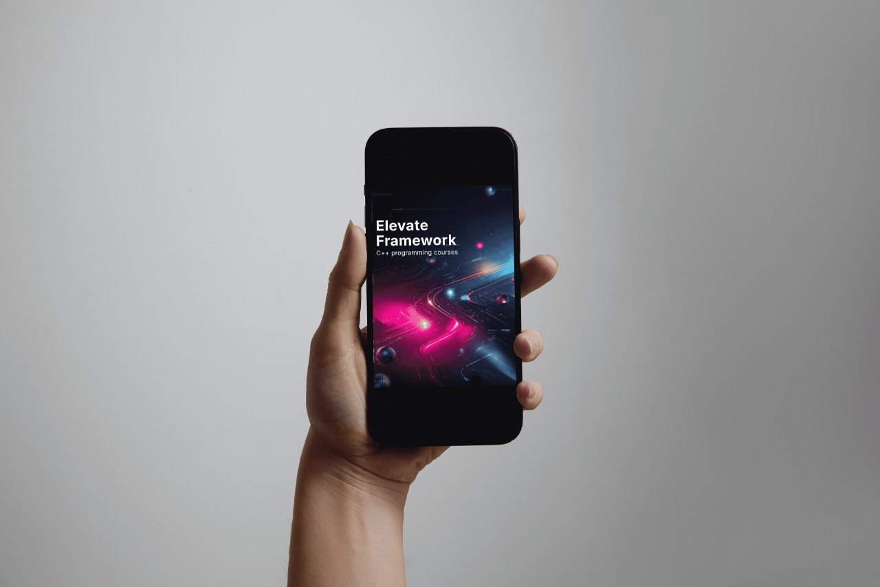 Hand holding a smartphone with 'Elevate Framework' app displayed on a gray background