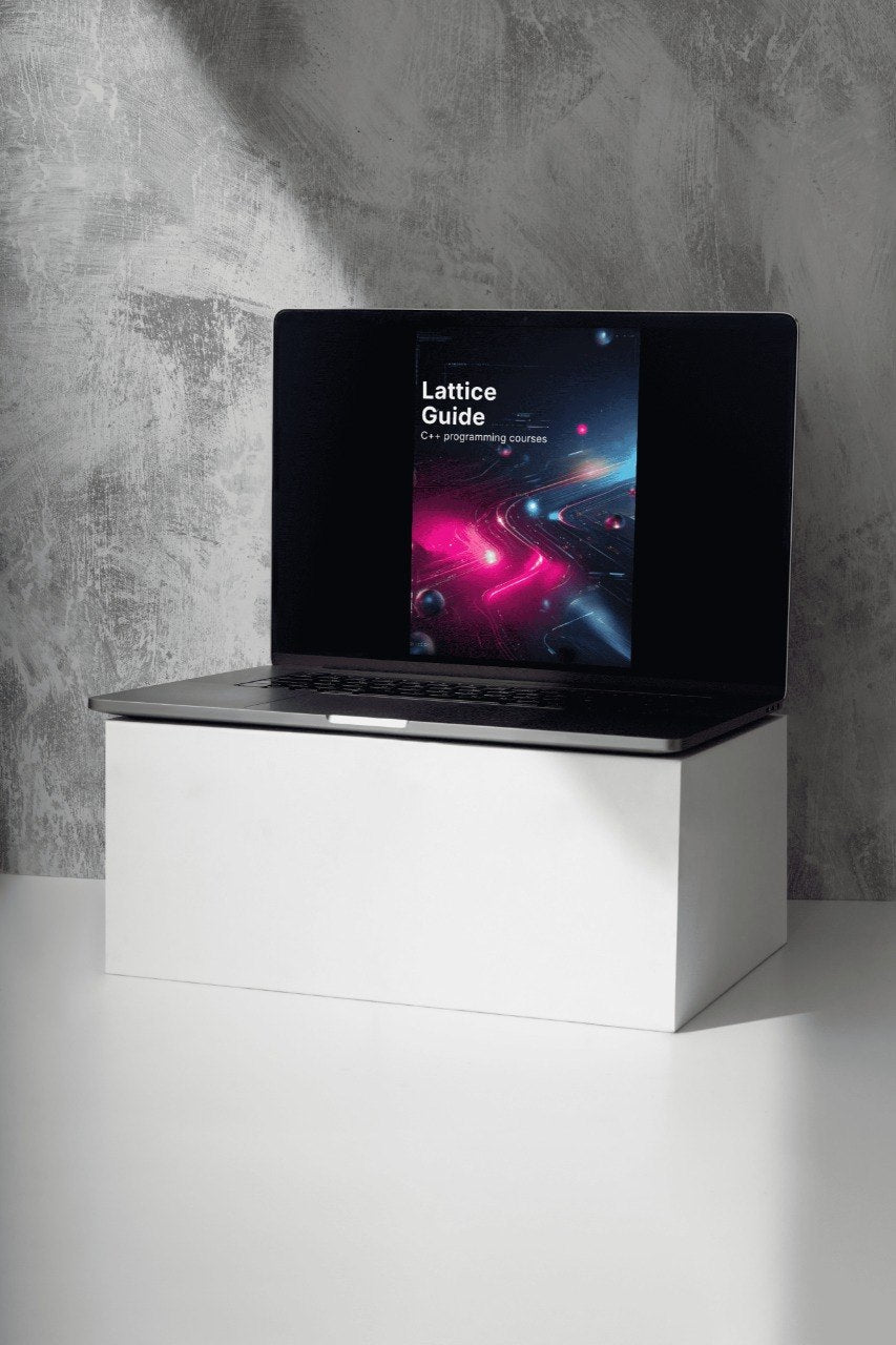 Laptop on a white stand against a gray concrete wall